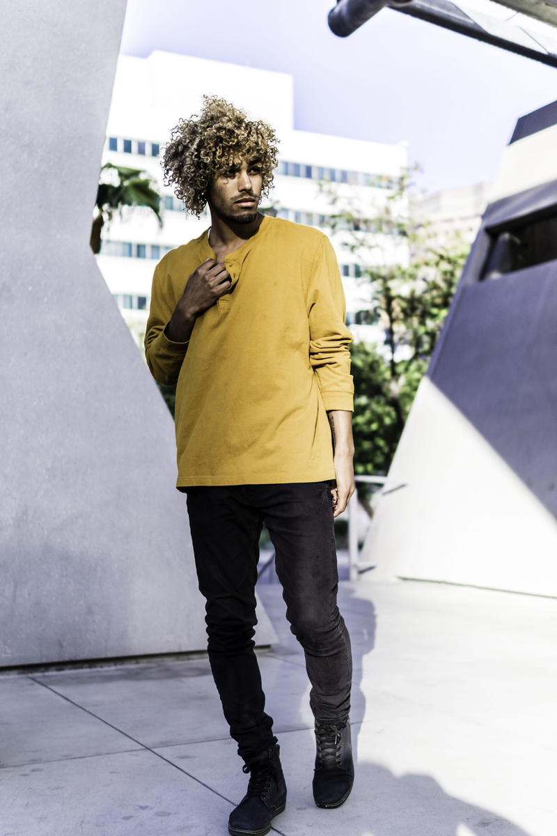 wall, leisure activity, long, outdoors, motor vehicle, car, full length, portrait, casual clothing, hairstyle, wearing, jeans, black, transportation, shirt