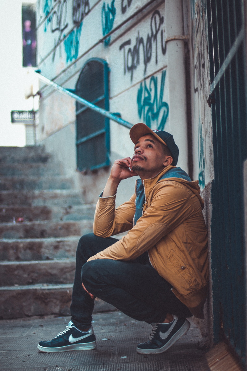 hat, young men, mobile phone, cap, lifestyles, male, looking away, side view, real people, person, algeria, stair, alger centre, full length, human, young adult