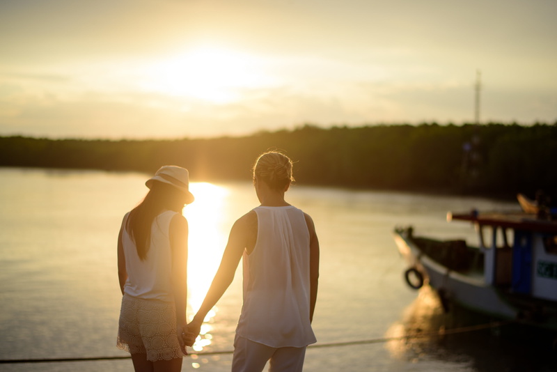 two, holding hands, outdoors, two People, sunlight, nautical vessel, lake, holding, people, love, reflection, bonding, water, adult, sunset, happiness