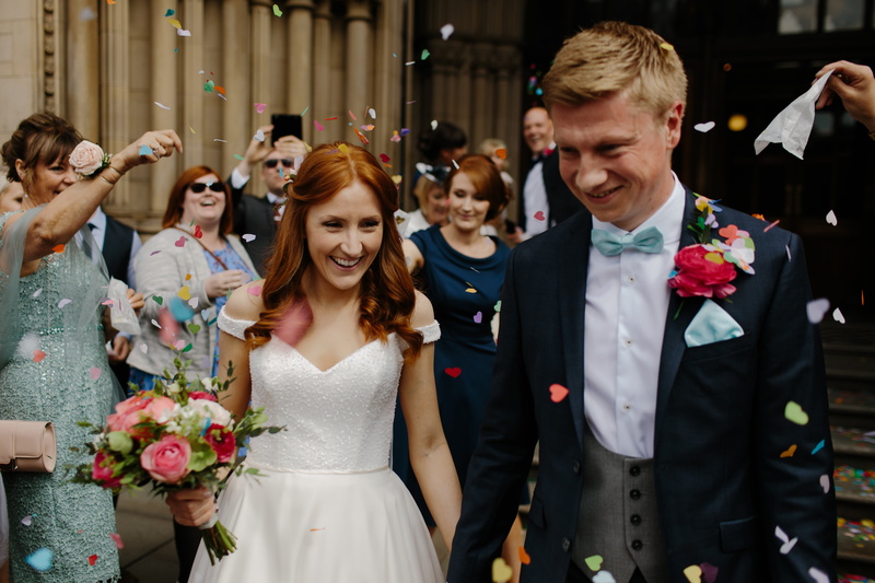 holding, wife, crowd, married, gown, positive emotion, happy, surrounded, men, emotion, party, bride, women, bridegroom, reception, bouquet, hands, formalwear