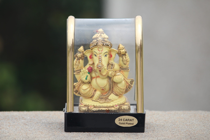 book, human representation, music, art and craft, creativity, idol, no people, indoors, education, gold, gold colored, close-up, pattern, lord wisdom, focus on foreground