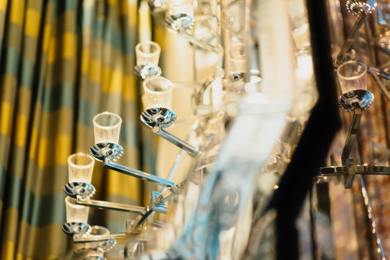 light, focus, in a row, hanging, factory, day, human skeleton, 5K, photography, no people, selective focus, shallow, candelabra, focus on foreground, chandelier