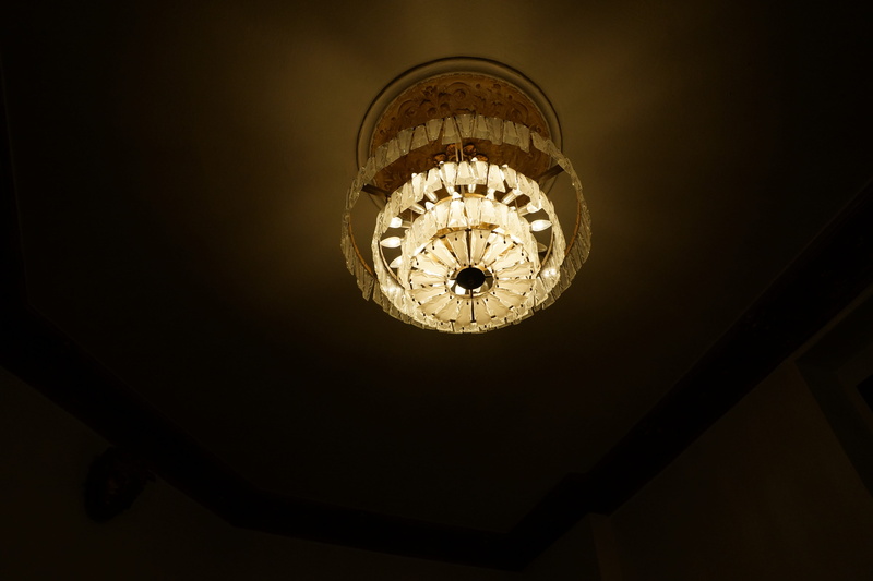 day, low angle view, electricity, glass, lighting equipment, turned on, chandelier, electric lamp, close-up, turned, ceiling, directly below, pendant light