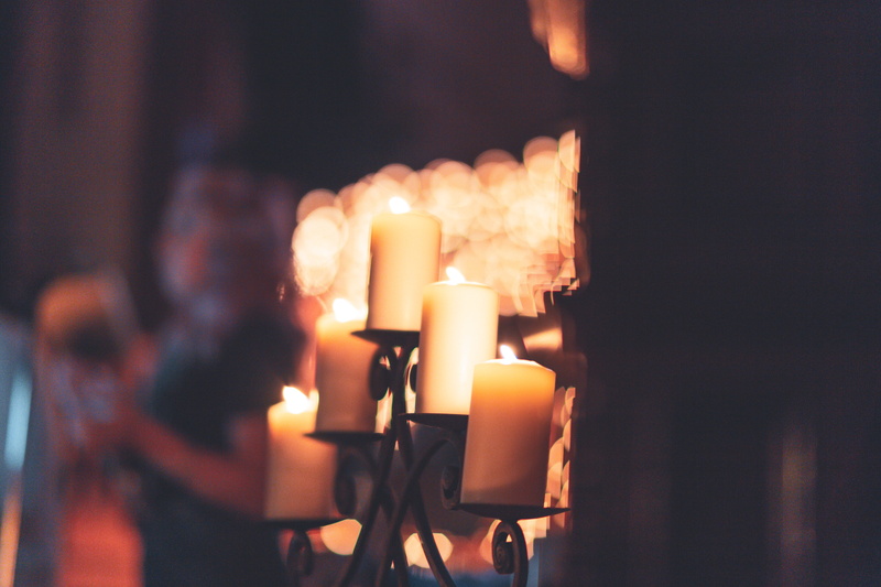 indoors, burn, night, focus on foreground, adult, romantic, fire - natural phenomenon, heat - temperature, wax, candlesticks, burnt, candelabra, belief