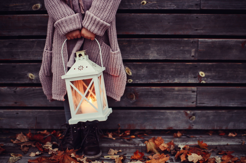 knit, lamp, warm clothing, decoration, candle, jeans, human hand, outdoors, wood - Material, clothing, gray, low section, day, unrecognizable person, autumn