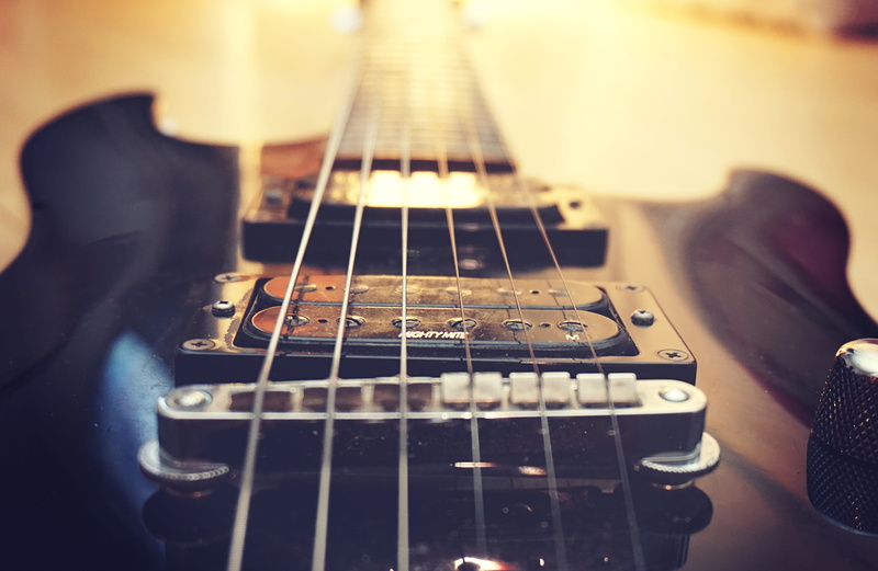music, musical instrument string, photography, electric guitar, rock music, setting, musical instrument, plucking an instrument, indoors, arts culture and entertainment