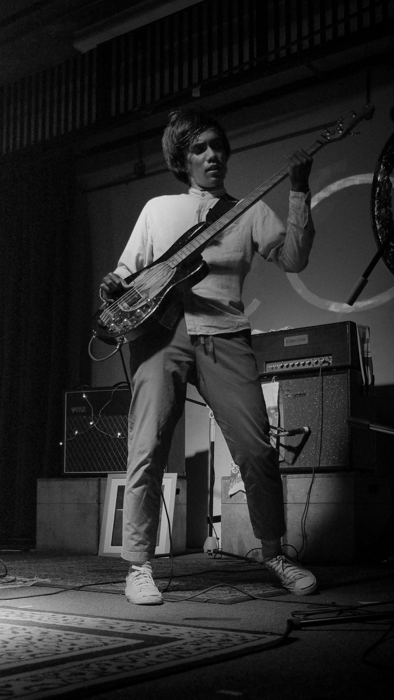 real people, men, music band, music, grayscale, human, crowd, shoe, man, lifestyles, performer, young adult, skill, young men, stage - performance space