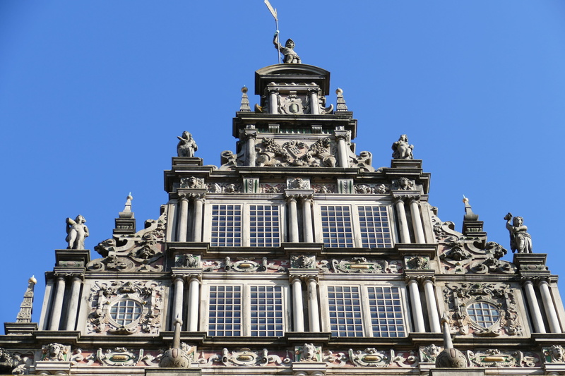 tourism, building exterior, human representation, clock, blue, tower, facade, tourist attraction, historically, art and craft, no people, sculpture, travel destinations