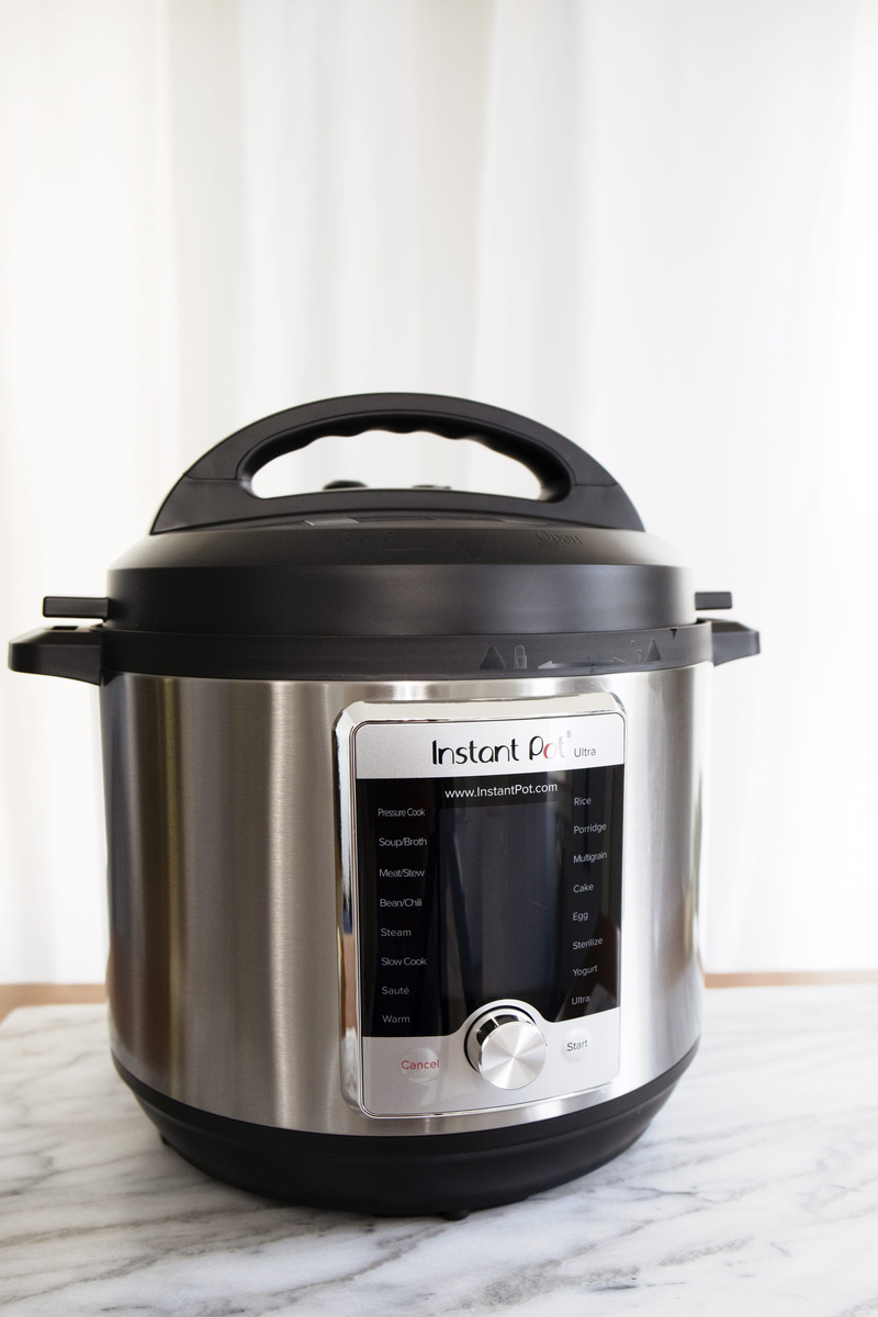oven, black, logo, retro styled, trademark, machine, silver colored, 5K, single object, table, iron, still life, indoors, technology, wheel, steel, rice