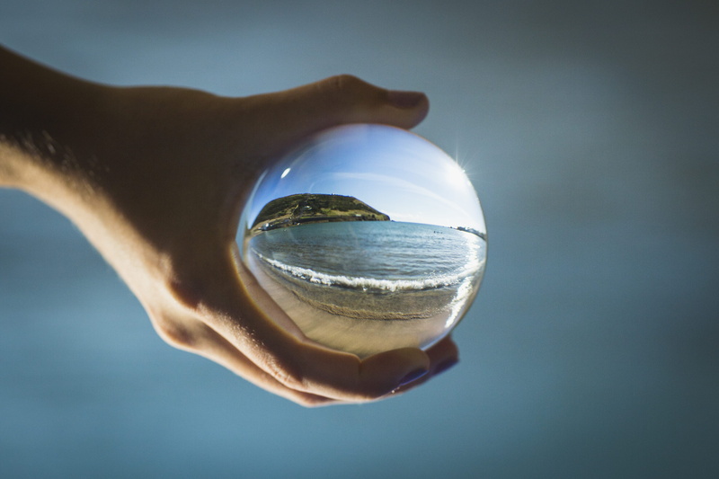 reflection, person, digital composite, sphere, glass, transparent, colored background, contemplation, glass - material, business, fortune telling, ball
