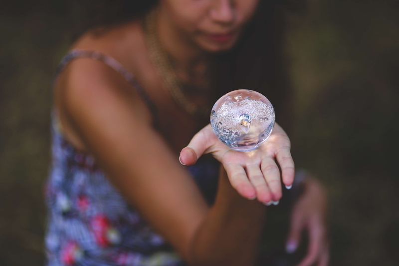 future, focus on foreground, sphere, hands cupped, contemplation, offspring, selective focus, world at your fingertips, casual clothing, women, close-up