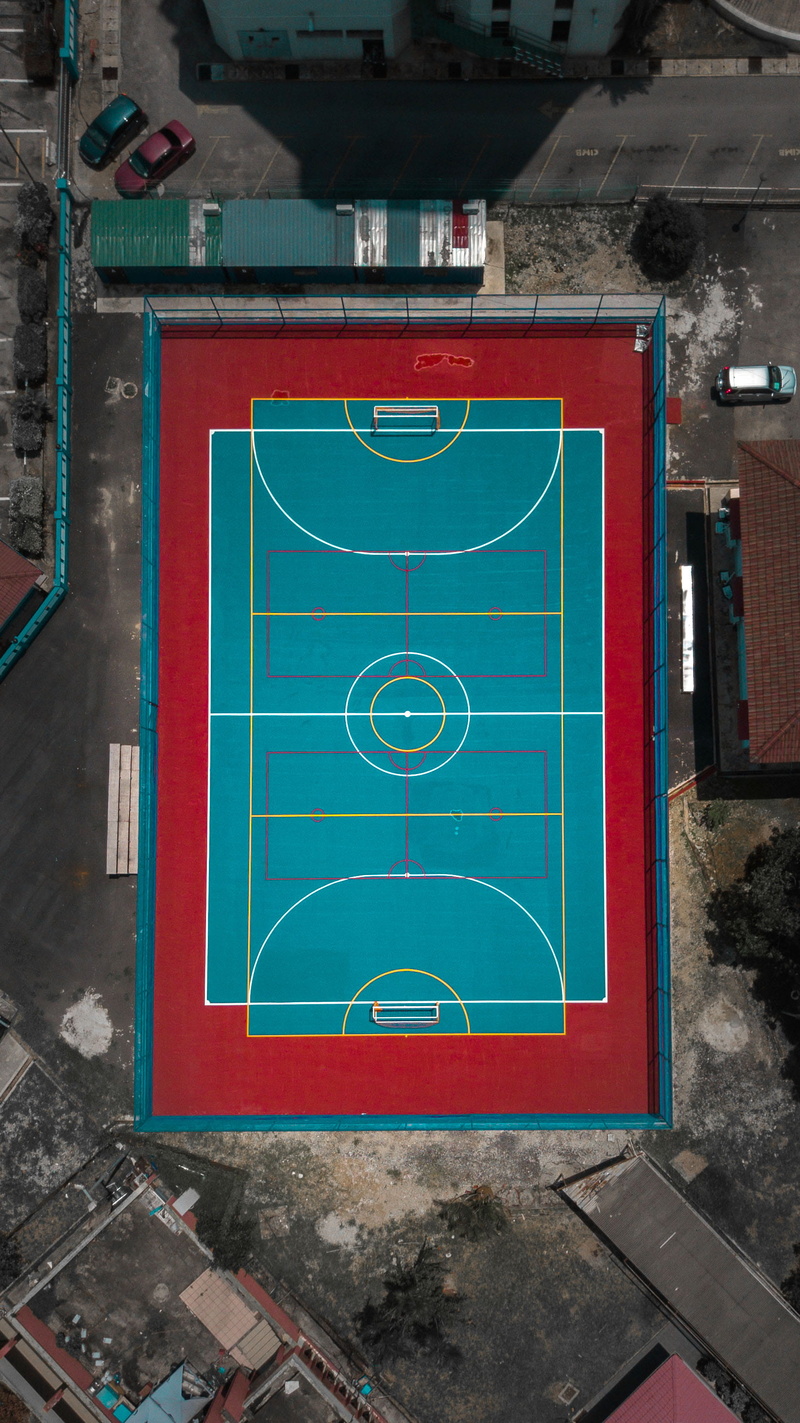 graffiti, topdown, soccer, field, brick wall, red, basketball - sport, aerial, day, shape, blue, arena, built structure, city, court, art and craft, aqua