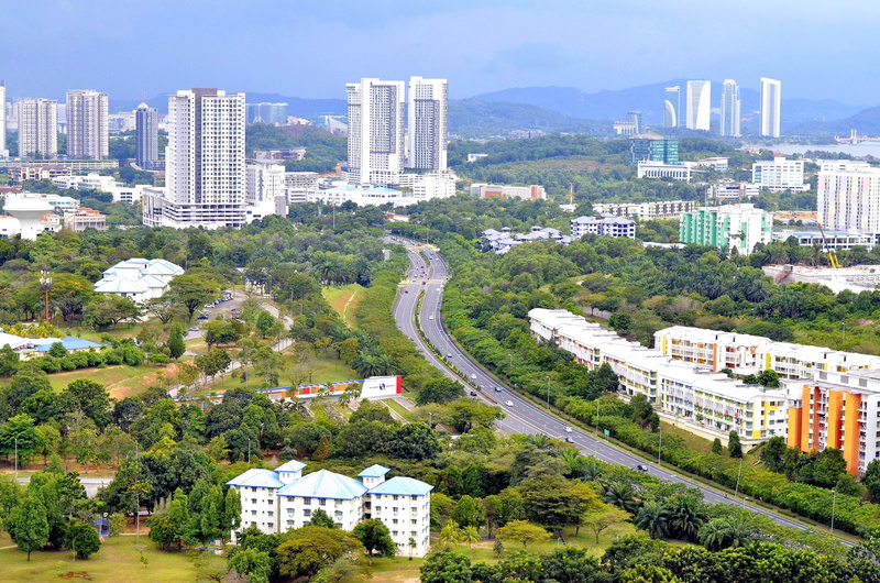 building, mountain, day, skyscraper, city, nature, kuala lumpur, high angle view, landmark, cityscape, building exterior, sky, growth, transportation, scenics - nature