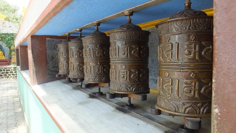 wall - building feature, 2K, buddhism, craft, in a row, Religion, belief, text, building, Kathmandu, metal, heritage, built structure, outdoors, communication