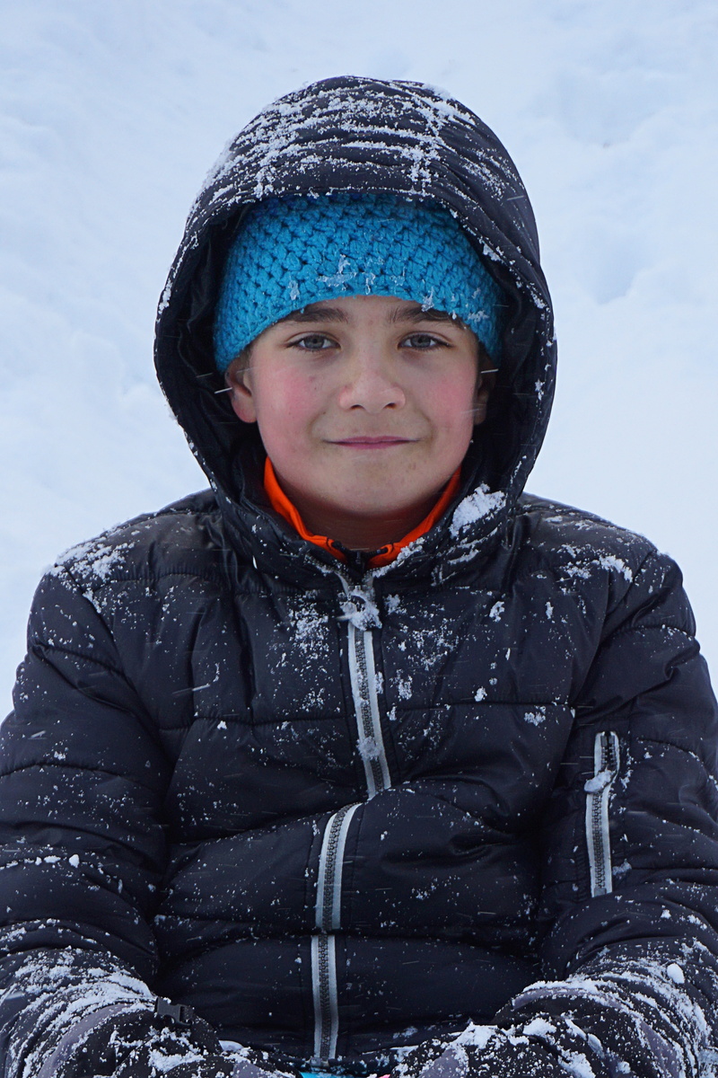 pre-adolescent child, white, childhood, warm clothing, cold, looking at camera, cold temperature, wintry, hat, leisure activity, snow, child, knit hat