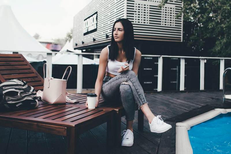 sitting, 2K, jeans, women outdoors, sneakers, swimming pool, portrait, women, eyeliner, looking away