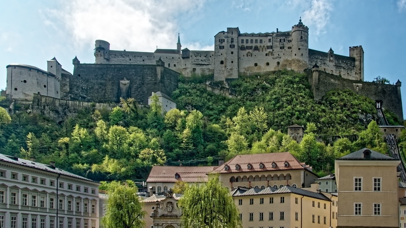 growth, plant, tree, building exterior, house, austria, castle, cloud - sky, salzburg, history, the past, low angle view, mountain, city, town castle, residential district