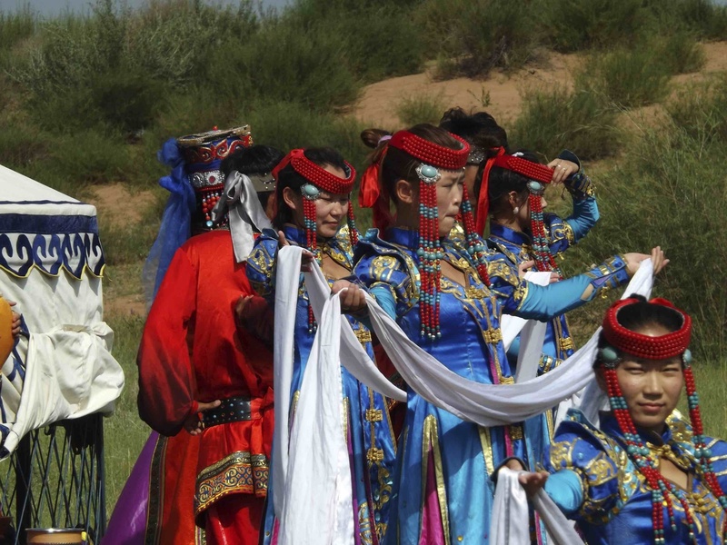 leisure activity, celebration, creativity, arts culture and entertainment, prairie, men, multi colored, costume, real people, inner mongolia, clothing