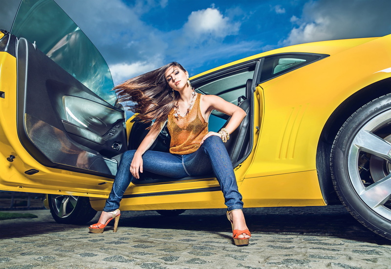 human limb, young women, full length, beautiful woman, blue, 1080P, beauty, outdoors, car, top, jeans, brown, motor vehicle, hairstyle, one person, young adult