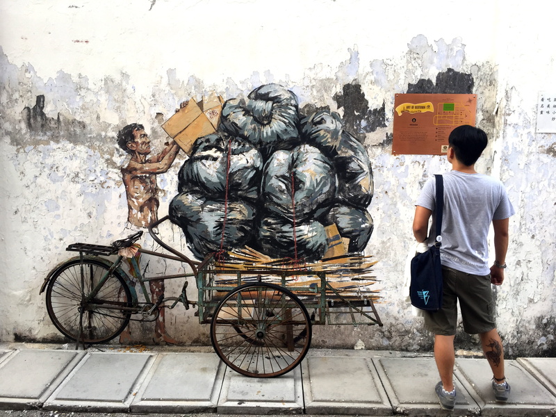 street art, wall - building feature, jalan shala, transportation, ernest zacharevic, rear view, day, one person, mode of transportation, architecture, artist