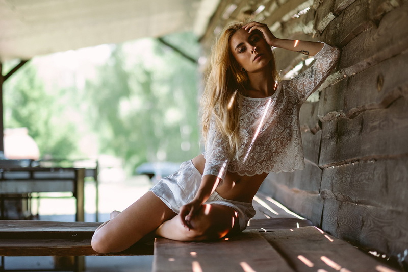 photographer, shorts, wavy hair, hips, Ernest K. Madej, navel, lips, looking at camera, sitting, top, hand in hair, 1080P, tummy, white top, girl, blonde