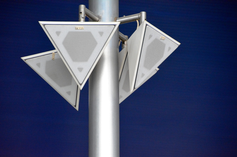 security, clear sky, studio shot, technology, single object, communication, protection, silver colored, airport, airport concorse, metal, blue, copy space