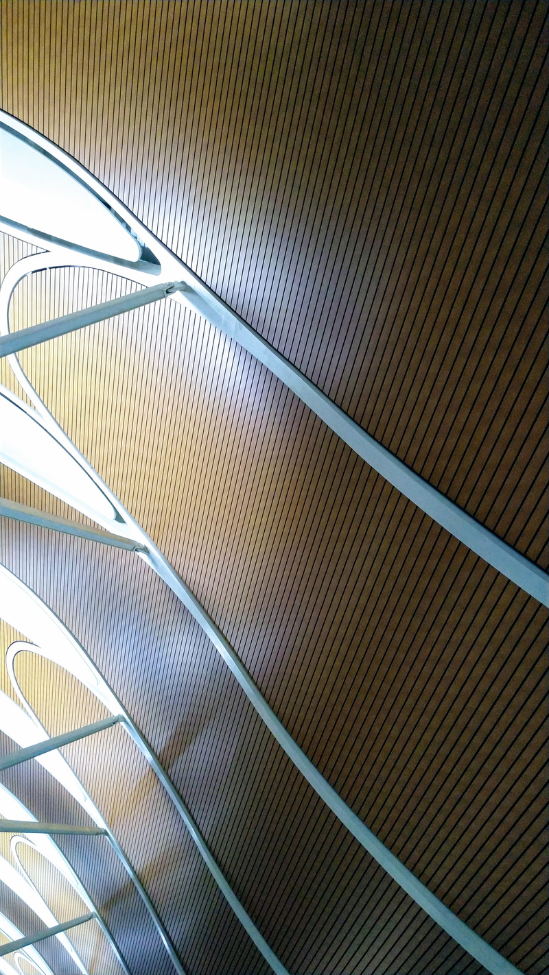 sunlight, illuminated, silver colored, wall - building feature, china, textured, escalator, modern, built structure, architectural feature, metal, low angle view