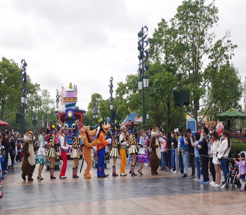 tree, architecture, large group of people, cloud - sky, shanghai disneyland, street, plant, group of people, celebration, women, shanghai, crowd, men, sky