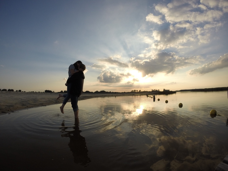 back light, abendstimmung, holidays, sky, sun, tranquil scene, kiss, full length, couple, scenics - nature, clouds, girl, standing, romantic, beauty in nature