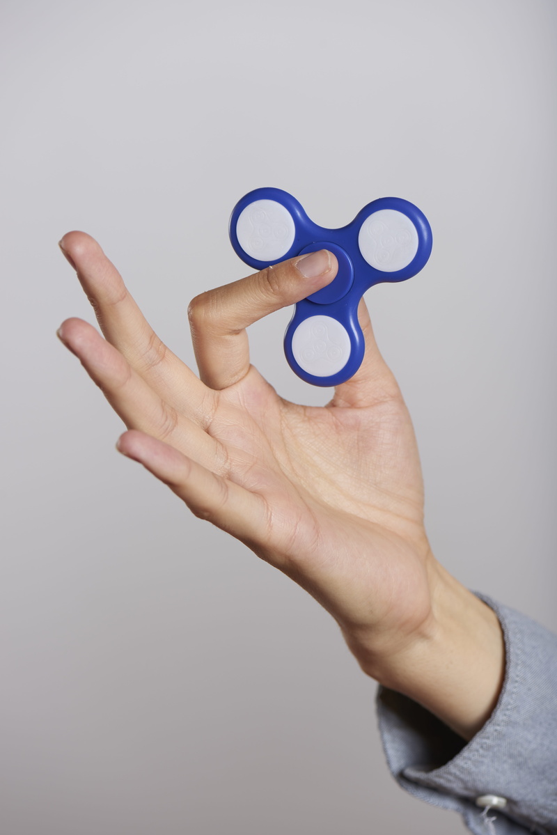 body part, unrecognizable person, white background, stress, gray background, popular, holding, cut out, relaxation, anxiety, human limb, focus, fidget spinner