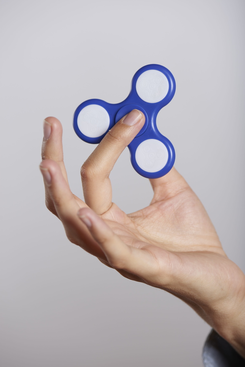 adult, energy, game, communication, fun, relaxation, unrecognizable person, human limb, human body part, fad, roller, rotating, fidget spinner, finger