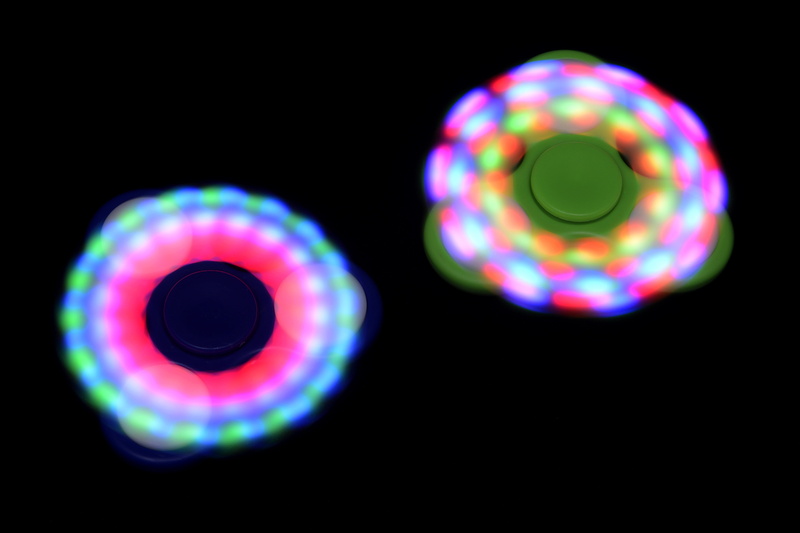 shape, indoors, balance, circle, light, motion, fun, turn, close-up, patience, single object, lights, relaxation, light - natural phenomenon, roundabout
