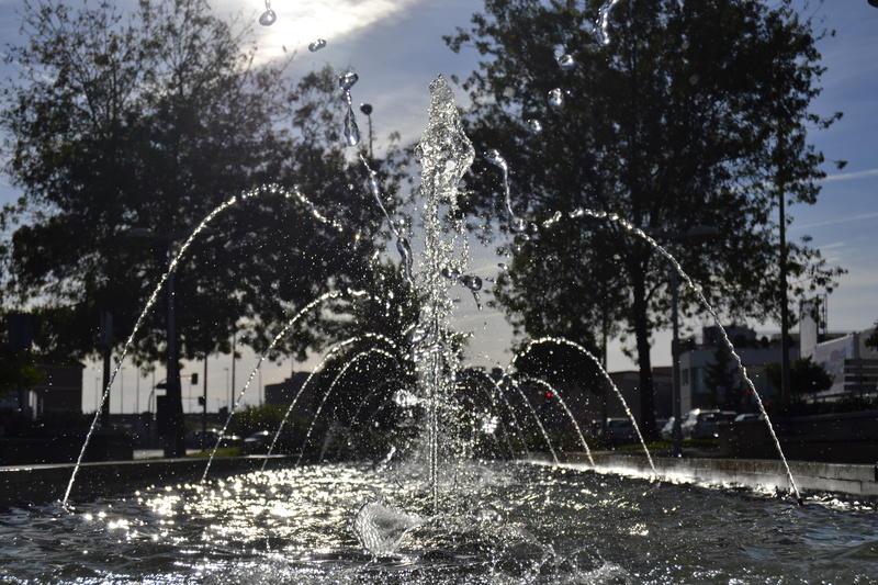 sky, spraying, splashing, day, building exterior, water, plant, 4K, long exposure, tree, built structure, waterfront, nature, flowing water, outdoors
