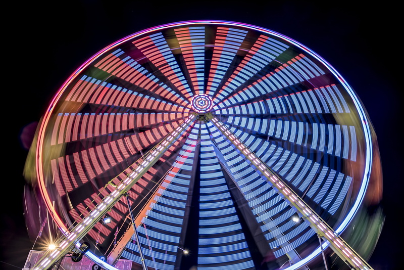 no people, architecture, built structure, speed, amusement park, circle, illuminated, night, colorful, spinning, fun, arts culture and entertainment, pattern