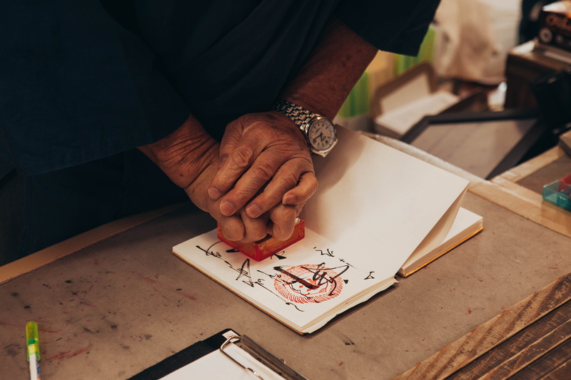 indoors, 5K, human hand, real people, craft, plywood, midsection, wood, art and craft, text, tōdai-ji, skill, handwriting, holding, pumping, senior adult
