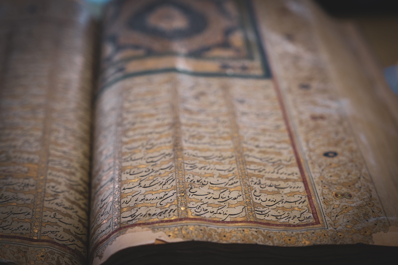 no people, qazvin, diary, craft, religion, older, high angle view, still life, indoors, oldest, spiral, history, the past, architecture, coil, novel, old