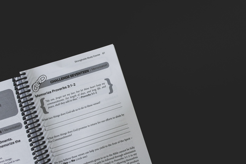 copy space, paper, communication, indoors, file folder, signature, alphabet, file binder, open, book, office building, western script, still life, studio shot