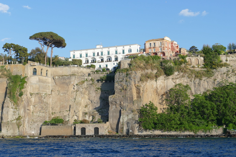 outdoors, travel, travel destinations, mediterranean, day, 5K, waterfront, hotel, nature, clear sky, cliff, architecture, building, coast, building exterior
