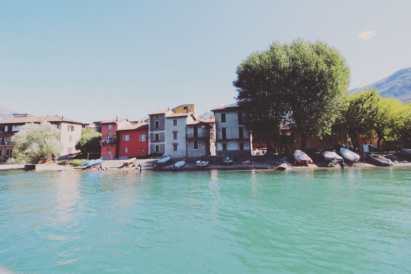 building exterior, waterfront, built structure, swimming pool, lake, pescarenico, nautical vessel, incidental people, transportation, outdoors, italy, tree