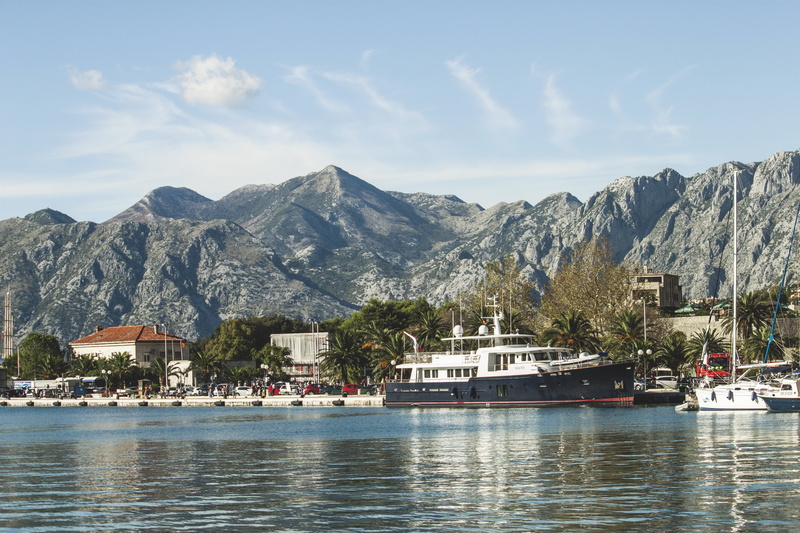 black, white, waterfront, plant, color Image, mountain range, no people, outdoors, nautical Vessel, sailing, water, beside, Ship, travel Locations, mode of transportation