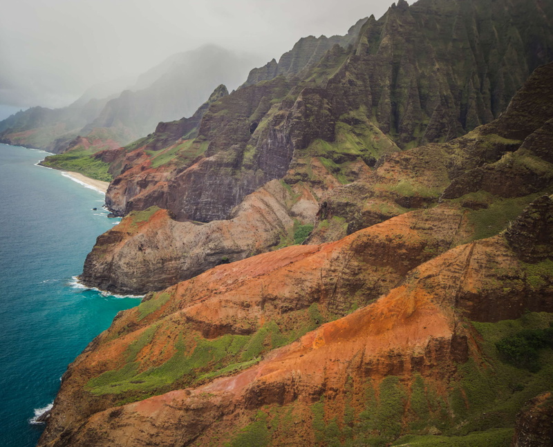 beauty in nature, sea, eroded, idyllic, mountain, rock - object, non-urban scene, rock formation, nature, tranquil scene, napali coast, scenics - nature