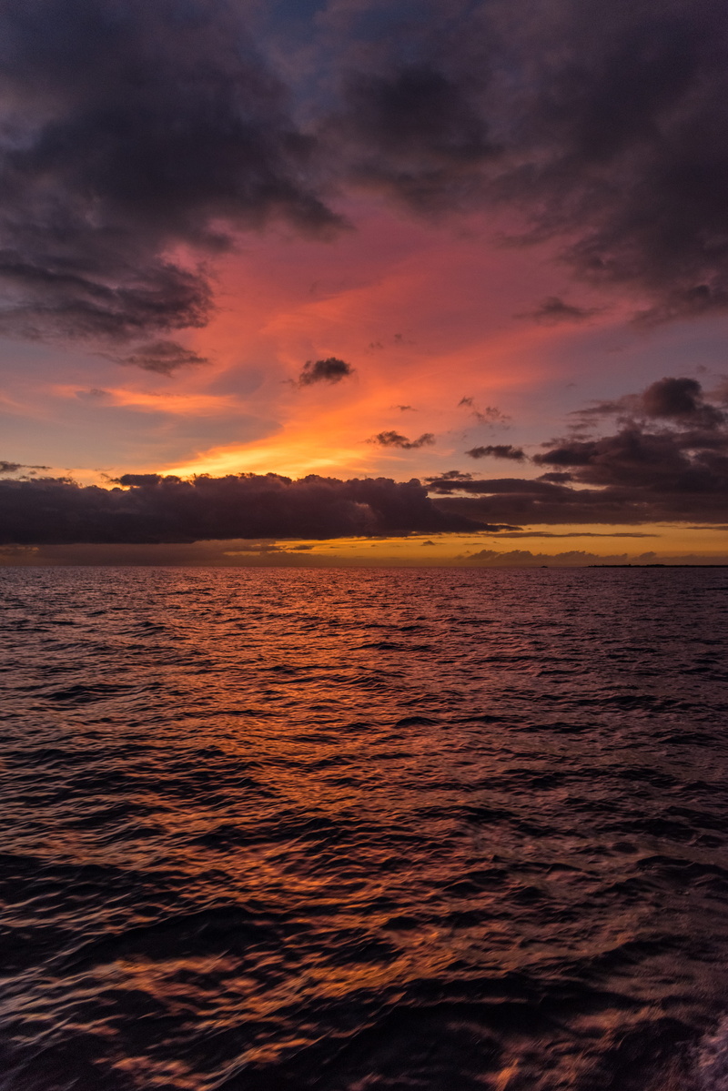 red sky, sea, scenics - nature, non-urban scene, nature, waterfront, the central pacific, outdoors, ocean, sunlight, orange color, horizon, hawaiia, tranquility