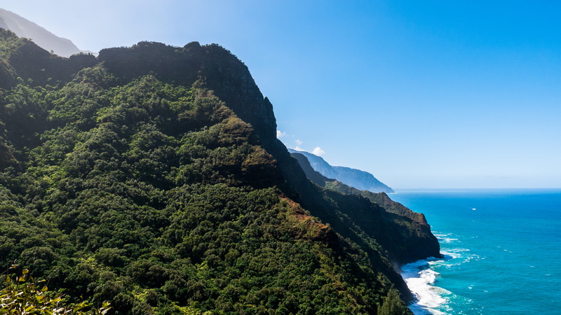 sky, trail, no people, land, tranquil scene, blue, beauty in nature, cliffs, united states, non-urban scene, mountain, green color, sea, tranquility, kauai