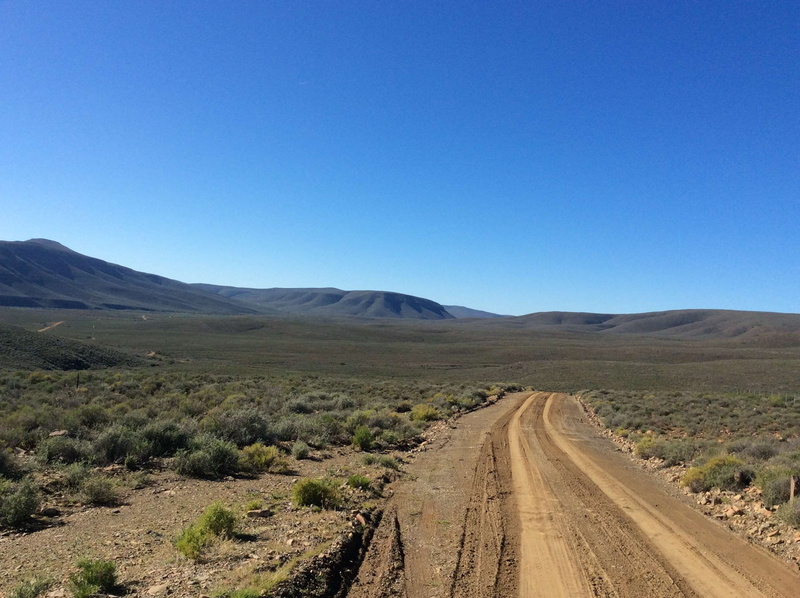 copy space, land, beauty in nature, non-urban scene, road trip, scenics - nature, semi-arid, no people, landscape, arid climate, mountain range, dirt road