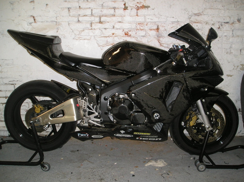 outdoors, day, scooter, carbon fiber best, wall - building feature, wheel, metal, transportation, equipment, 1080P, bicycle, garage, land vehicle, high angle view