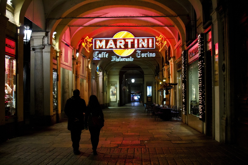 night, piemonte, lighting equipment, the way forward, real people, arch, city, people, illuminated, rear view, full length, men, lifestyles, aperitif, building