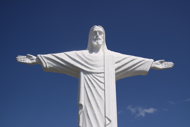 famous Place, low angle view, craft, white, blue sky, architecture, sunshine, monument, art and craft, human representation, day, male likeness, catholicism