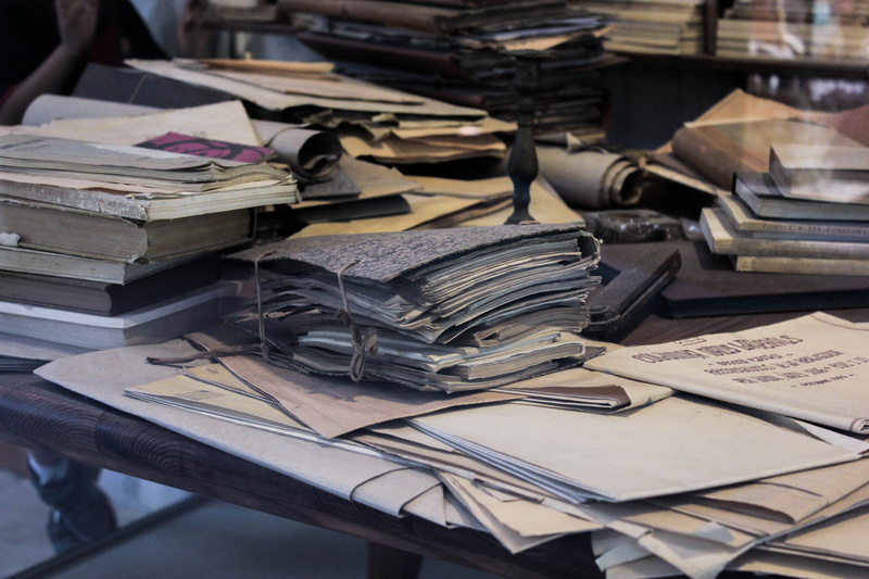 desk, paper, history, sagrada familia, old, focus on foreground, publication, catalonia, stack, book, still life, table, indoors, cathedral, learning, education