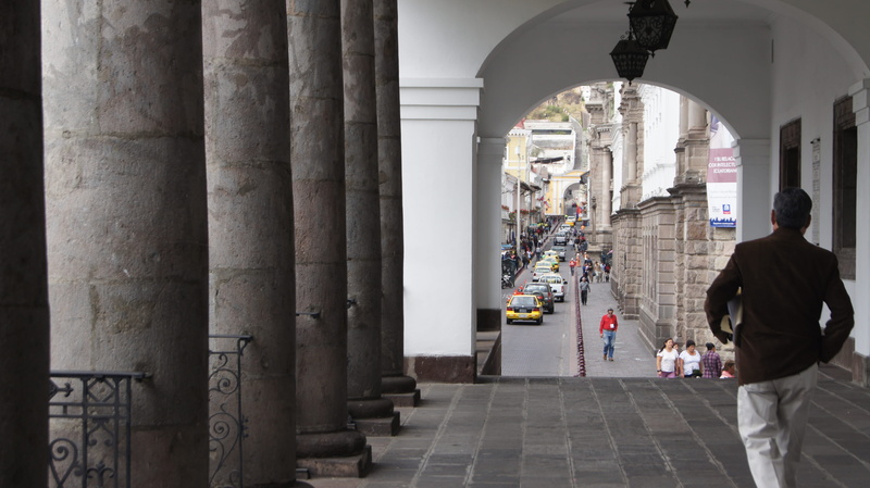 full length, city, taxis, incidental people, real people, building exterior, palacio de carondelet, arcade, walking, ecuadorian government, rear view, women