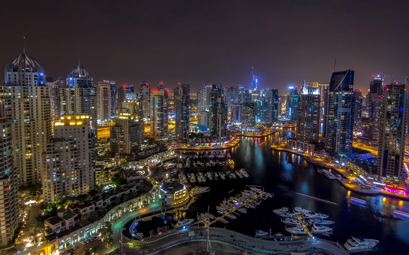 high angle view, building, marina, built structure, building exterior, outdoors, city, urban skyline, office building exterior, crowd, architecture, financial district